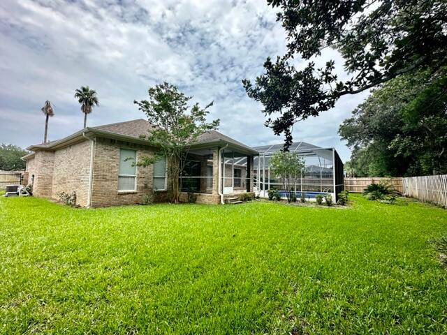 2024 Grayson Drive Navarre, FL 32566 - Photo 40 of 47 a front view of a house with a garden