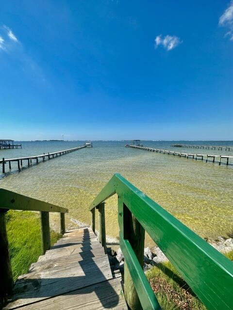 2024 Grayson Drive Navarre, FL 32566 - Photo 44 of 47 a view of swimming pool with seating area and hardwood floor