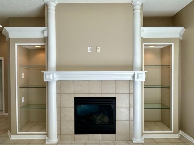 2024 Grayson Drive Navarre, FL 32566 - Photo 8 of 47 a living room with a fireplace and a fireplace