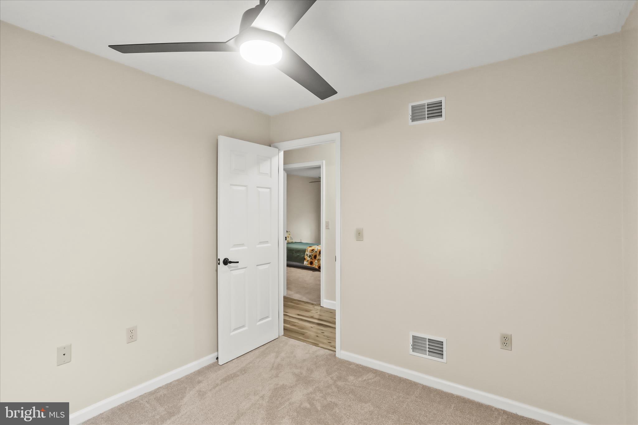 8 Magnolia Lane Hanover, PA 17331 - Photo 24 of 38 an empty room with an empty space and a ceiling fan