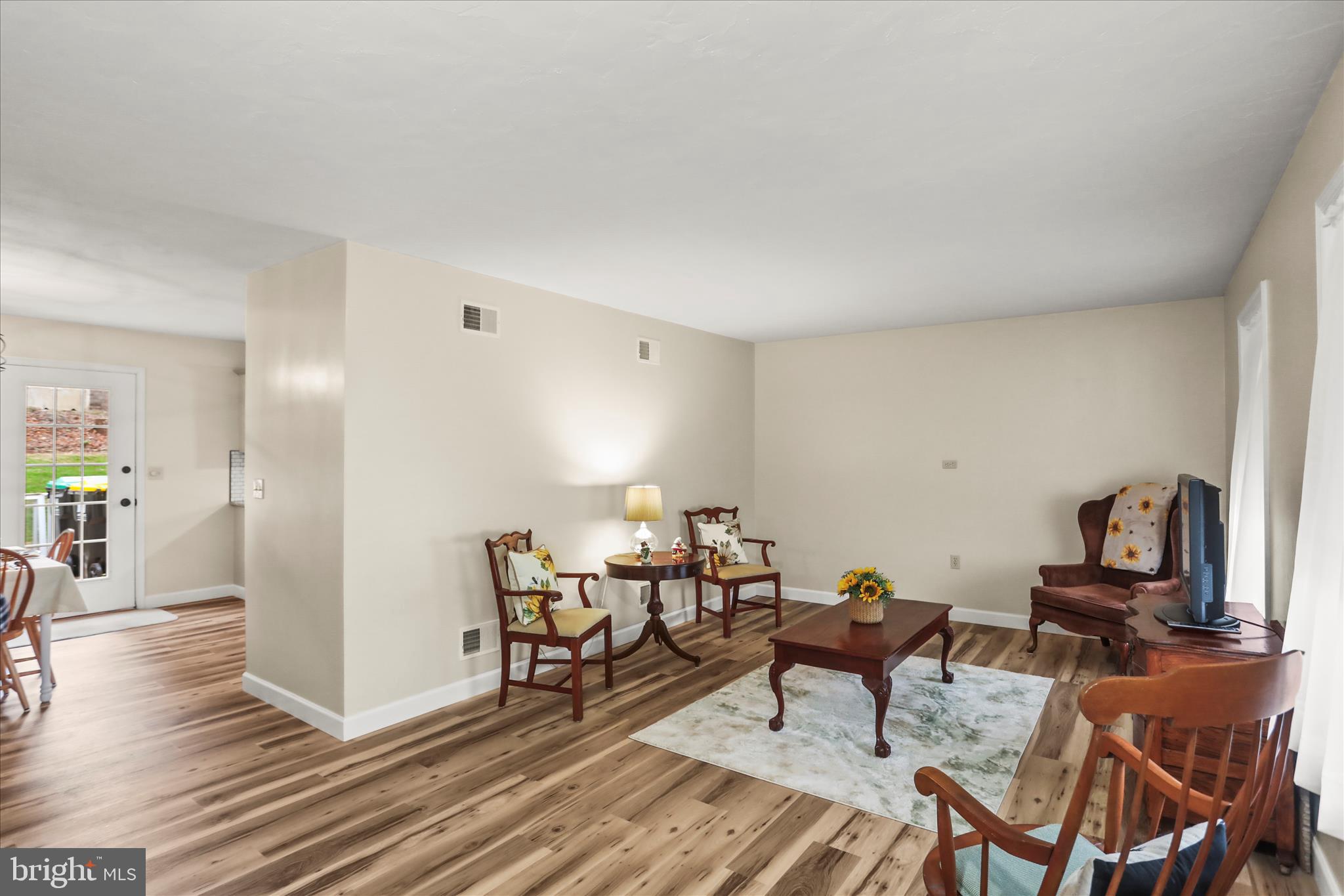 8 Magnolia Lane Hanover, PA 17331 - Photo 7 of 38 a living room with furniture a wooden floor and next to a window