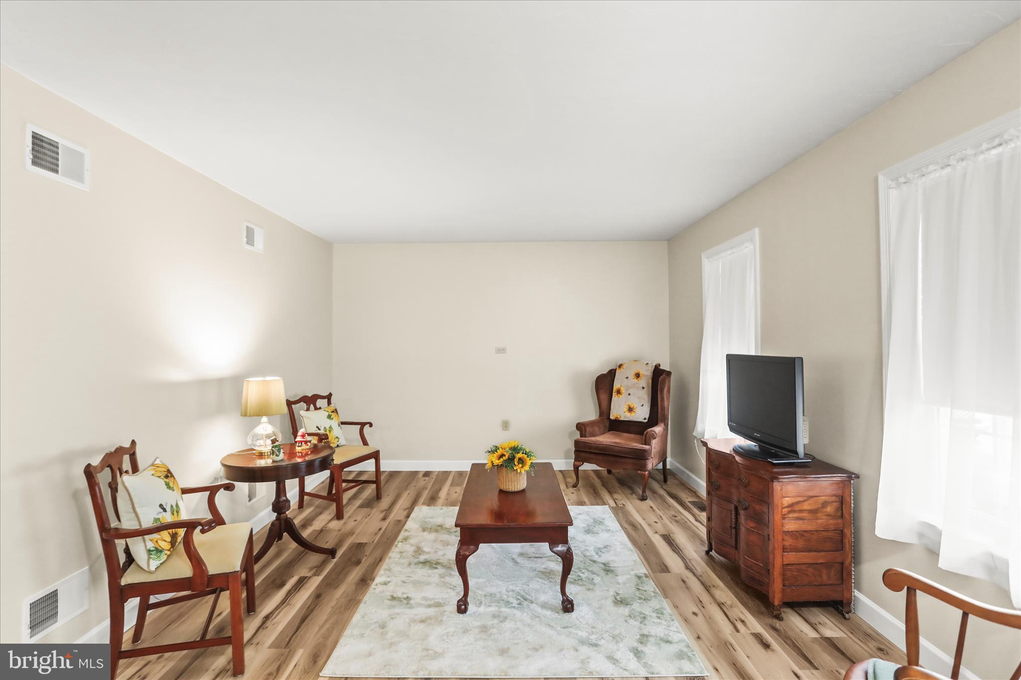 8 Magnolia Lane Hanover, PA 17331 - Photo 9 of 38 a living room with furniture and a flat screen tv
