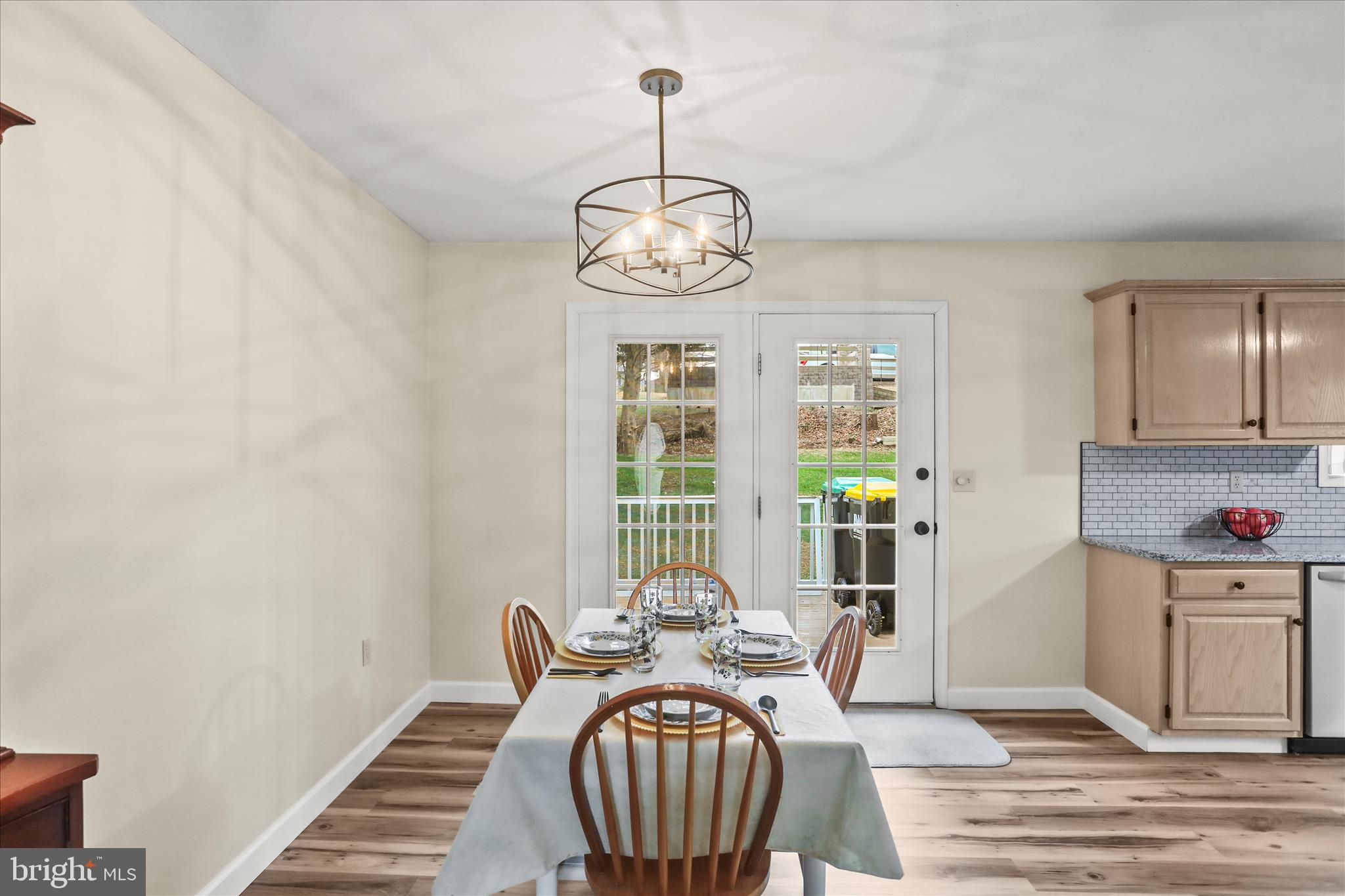8 Magnolia Lane Hanover, PA 17331 - Photo 10 of 38 a view of a dining room with furniture wooden floor and chandelier
