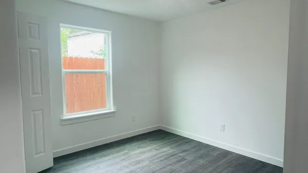 an empty room with a window