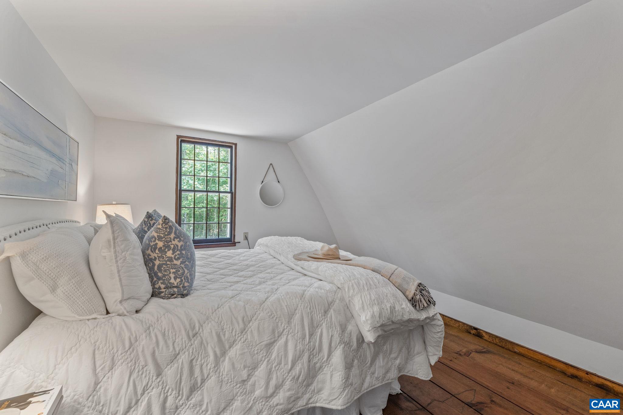 2175 Fray Road Ruckersville, VA 22968 - Photo 22 of 75 a bedroom with a bed and window