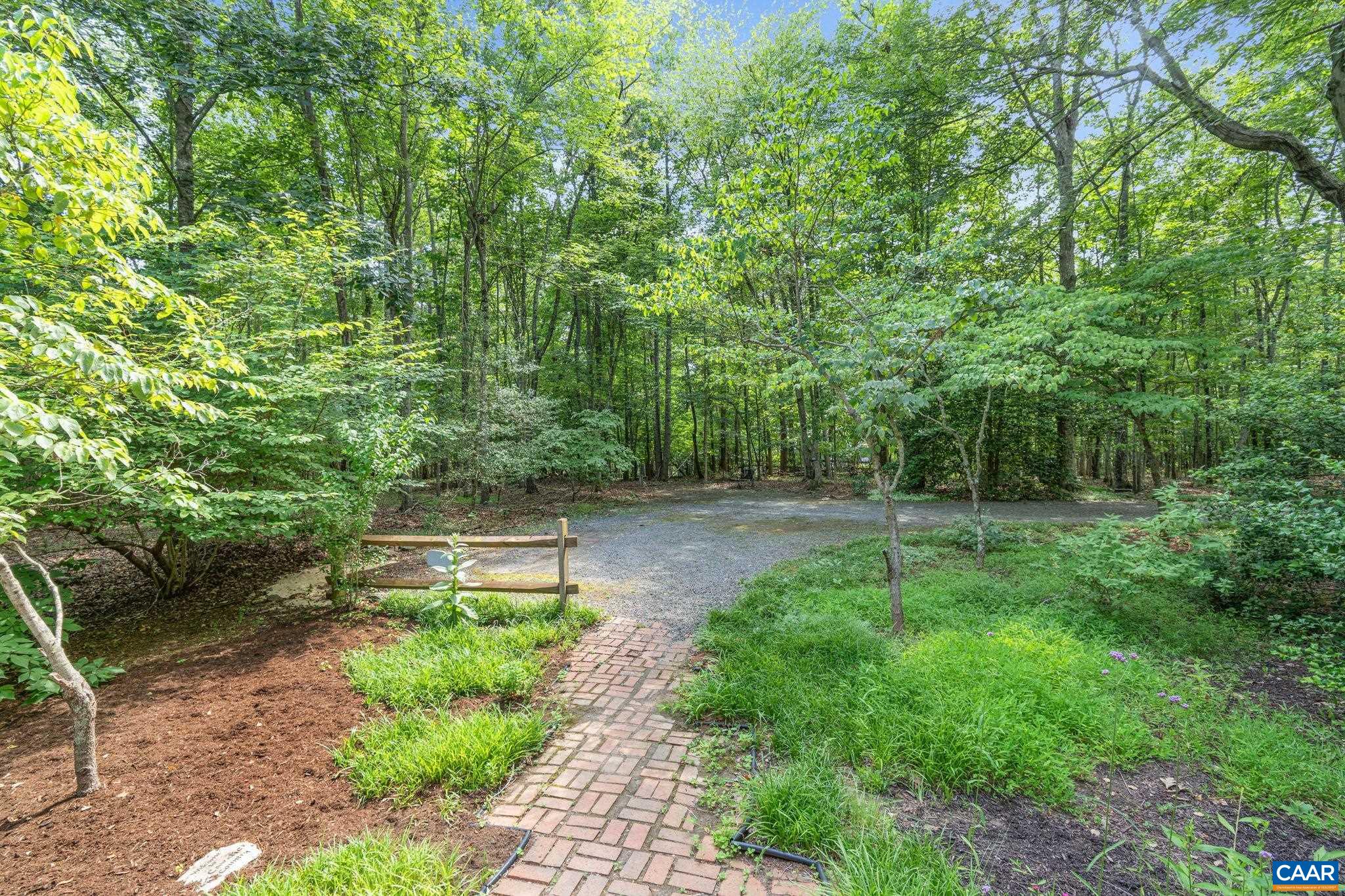 2175 Fray Road Ruckersville, VA 22968 - Photo 44 of 75 a view of green field with trees in the background