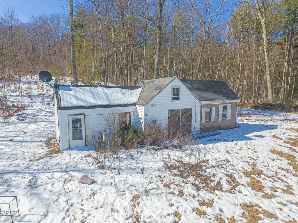 75 Cobb Hill Road Phillipston, MA 01331 - Photo 17 of 42 a front view of a house with a yard