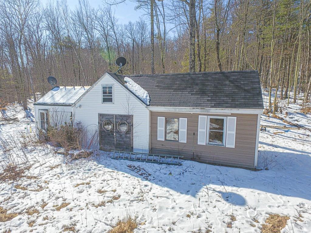 75 Cobb Hill Road Phillipston, MA 01331 - Photo 19 of 42 a front view of a house with a yard