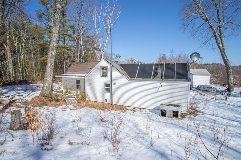 75 Cobb Hill Road Phillipston, MA 01331 - Photo 20 of 42 a view of a white house with a yard