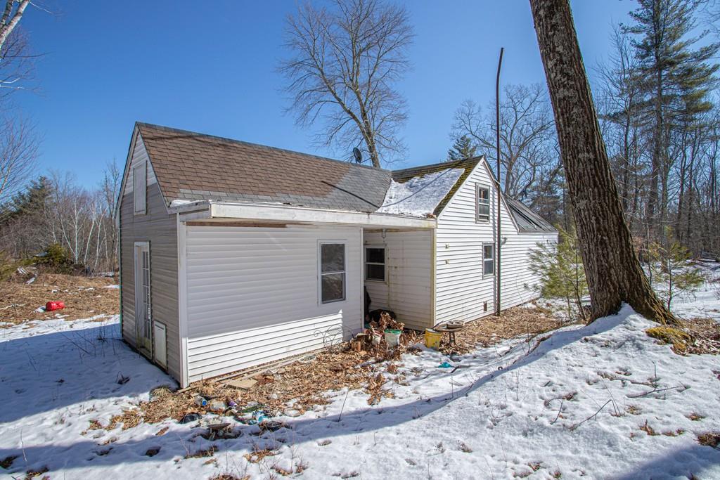 75 Cobb Hill Road Phillipston, MA 01331 - Photo 22 of 42 a view of a house with a yard covered in snow