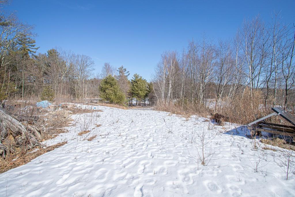 75 Cobb Hill Road Phillipston, MA 01331 - Photo 32 of 42 a view of a yard covered in snow