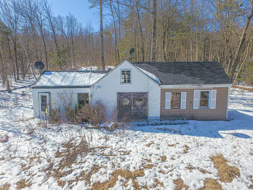 75 Cobb Hill Road Phillipston, MA 01331 - Photo 4 of 42 a front view of a house with a yard
