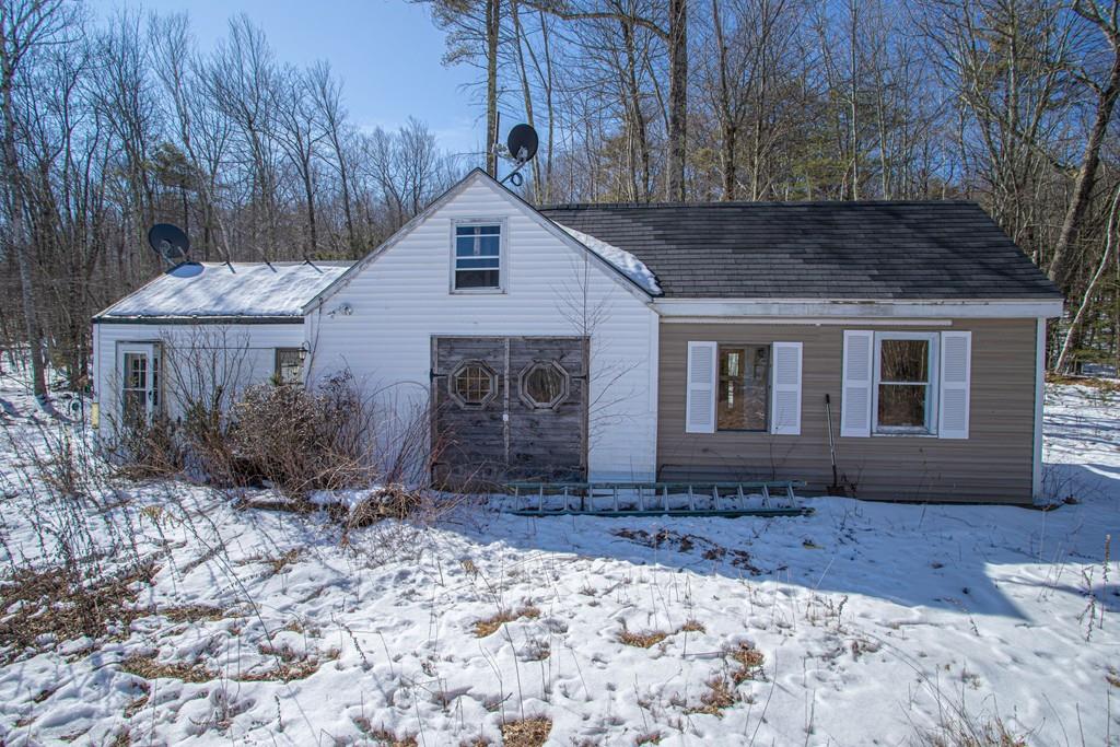 75 Cobb Hill Road Phillipston, MA 01331 - Photo 42 of 42 a front view of a house with garden