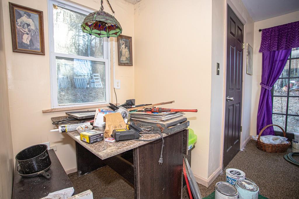 75 Cobb Hill Road Phillipston, MA 01331 - Photo 8 of 42 a view of a workspace with furniture and a window