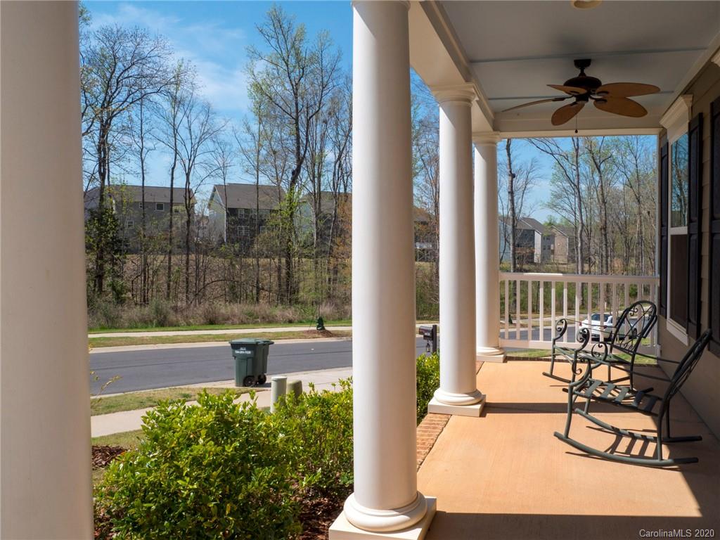 6018 Fallondale Road Waxhaw, NC 28173 - Photo 2 of 48 a view of a porch with chairs and backyard