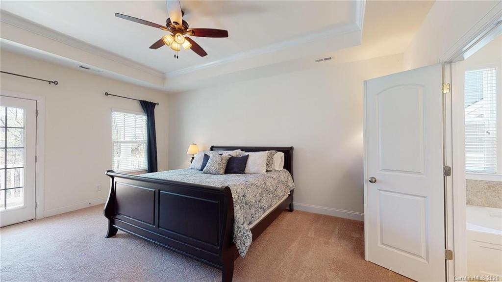6018 Fallondale Road Waxhaw, NC 28173 - Photo 23 of 48 a bedroom with a bed and window