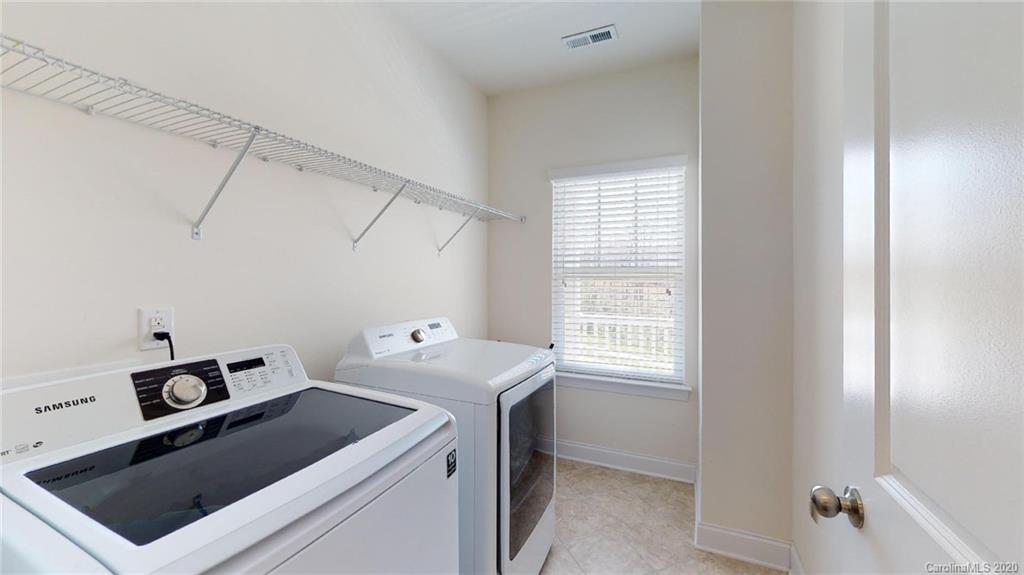 6018 Fallondale Road Waxhaw, NC 28173 - Photo 28 of 48 a utility room with dryer and washer