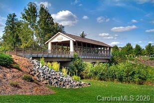6018 Fallondale Road Waxhaw, NC 28173 - Photo 36 of 48 a front view of a house with a garden and plants