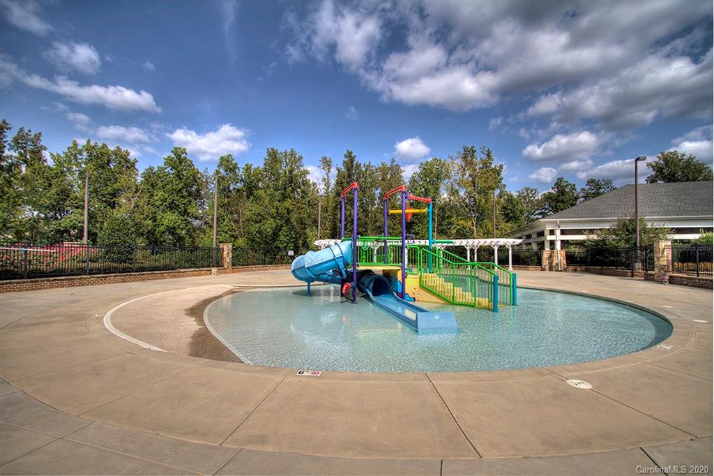 6018 Fallondale Road Waxhaw, NC 28173 - Photo 42 of 48 a view of a swimming pool with a patio