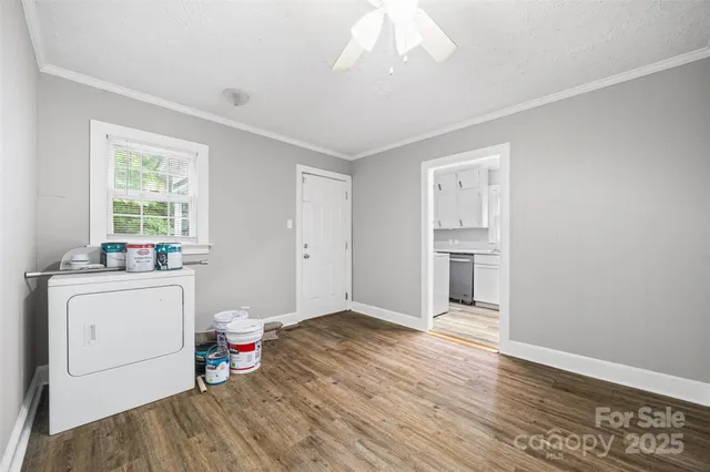 a view of livingroom with hardwood floor and hallway