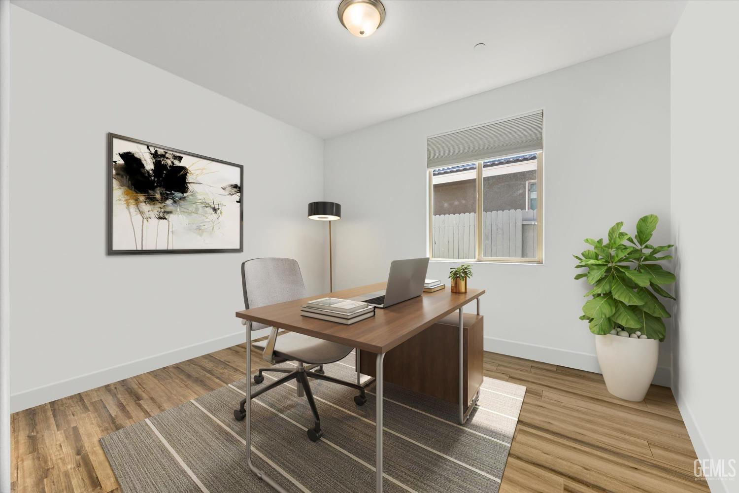 Undisclosed Address Bakersfield, CA 93314 - Photo 15 of 43 a dining room with furniture and wooden floor