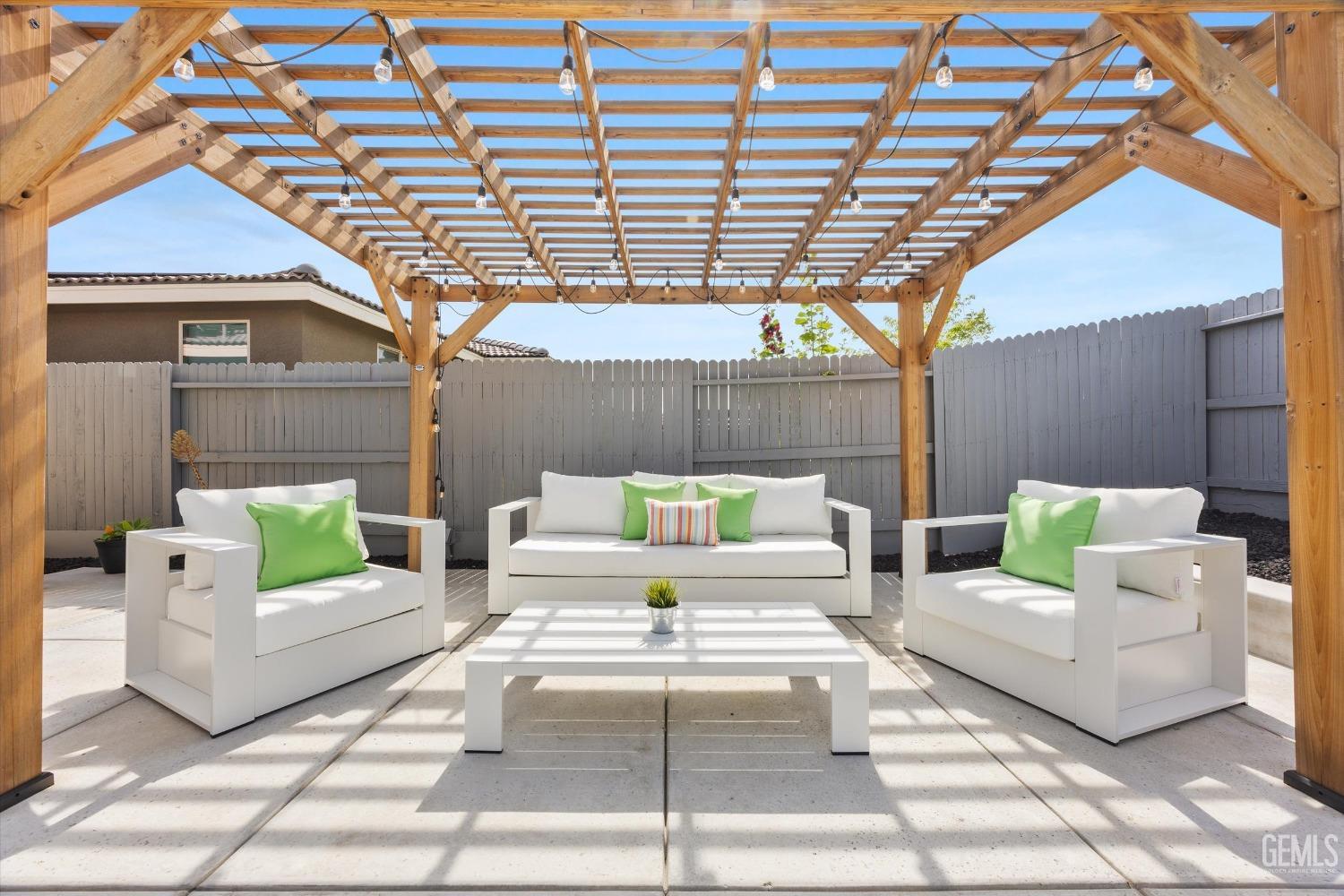 Undisclosed Address Bakersfield, CA 93314 - Photo 42 of 43 a living room with furniture and a chandelier