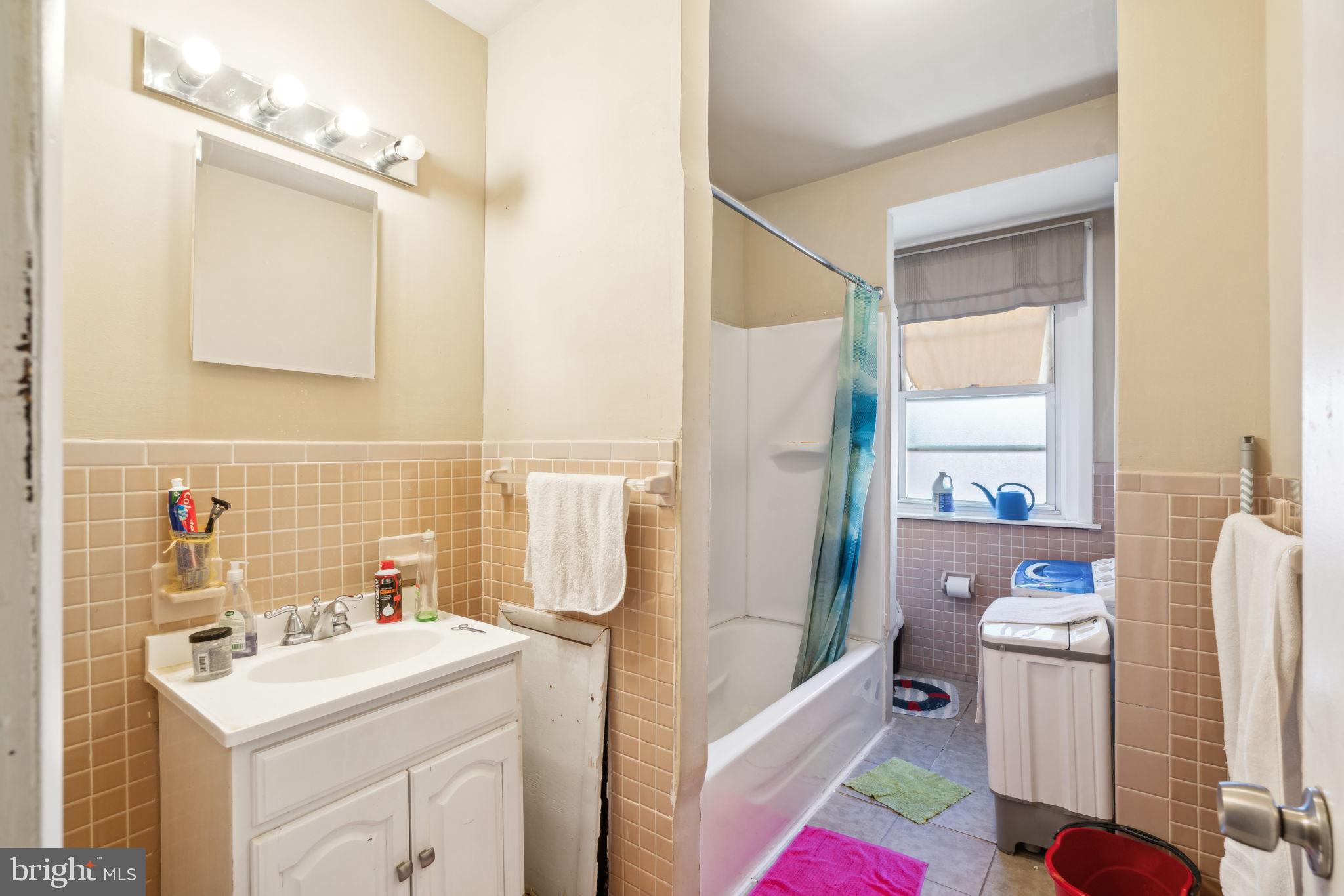 4036 Spring Garden Street Philadelphia, PA 19104 - Photo 17 of 46 a bathroom with a sink toilet and shower