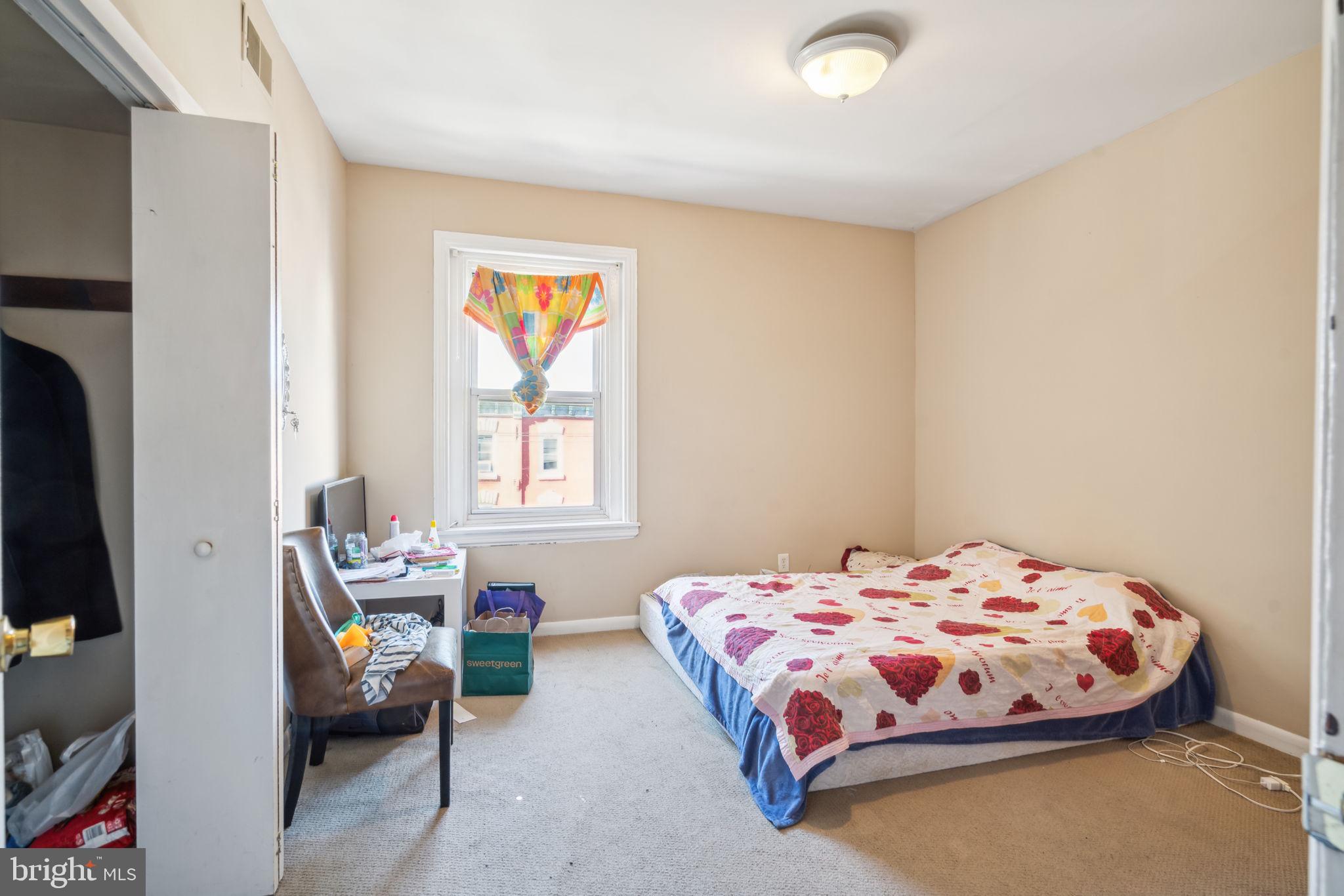 4036 Spring Garden Street Philadelphia, PA 19104 - Photo 20 of 46 a bedroom with a bed and a window