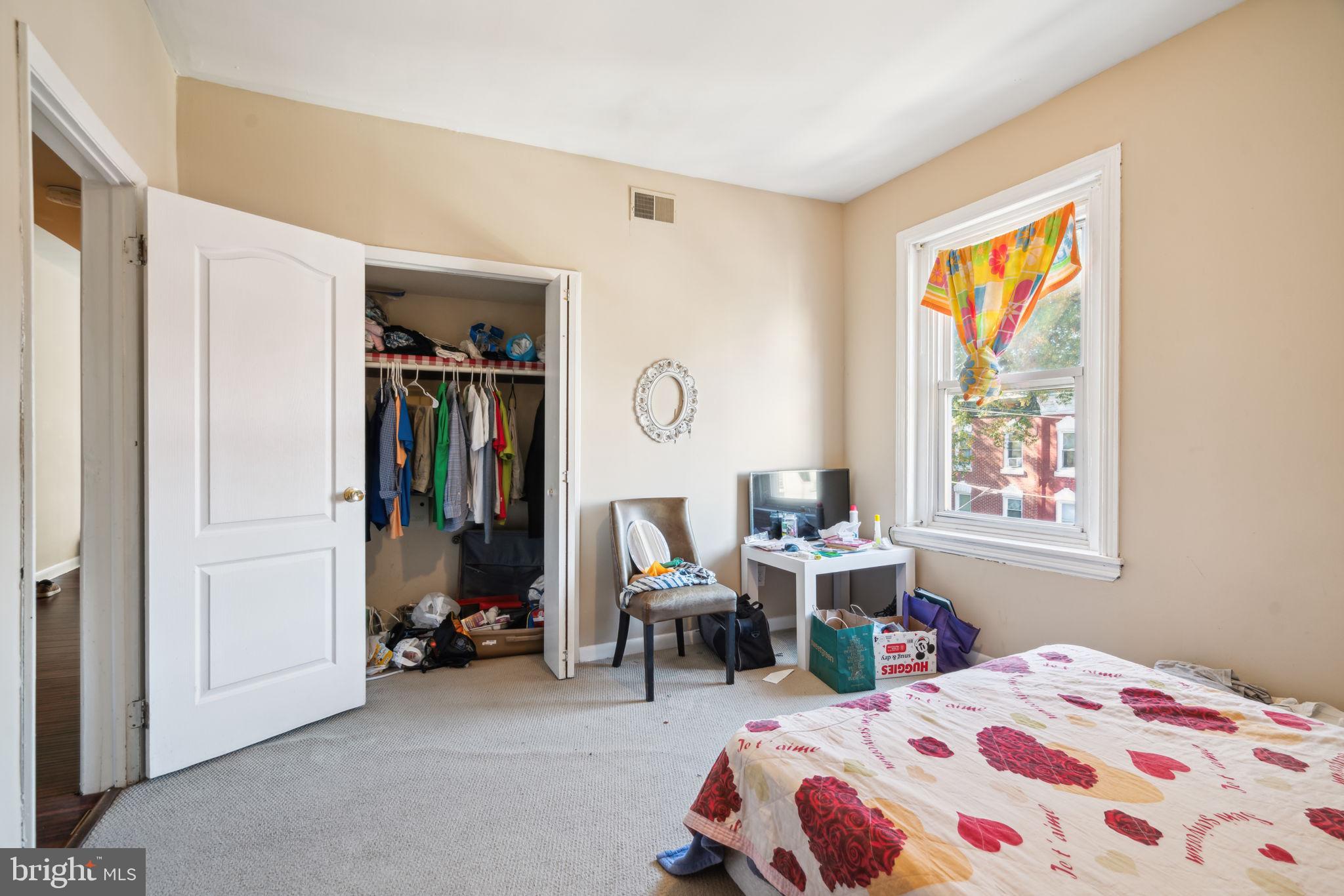 4036 Spring Garden Street Philadelphia, PA 19104 - Photo 21 of 46 a bed room with a bed and a window