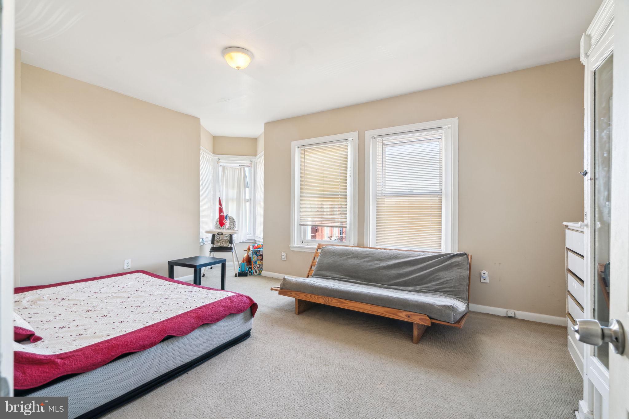 4036 Spring Garden Street Philadelphia, PA 19104 - Photo 23 of 46 a bedroom with a bed and a window