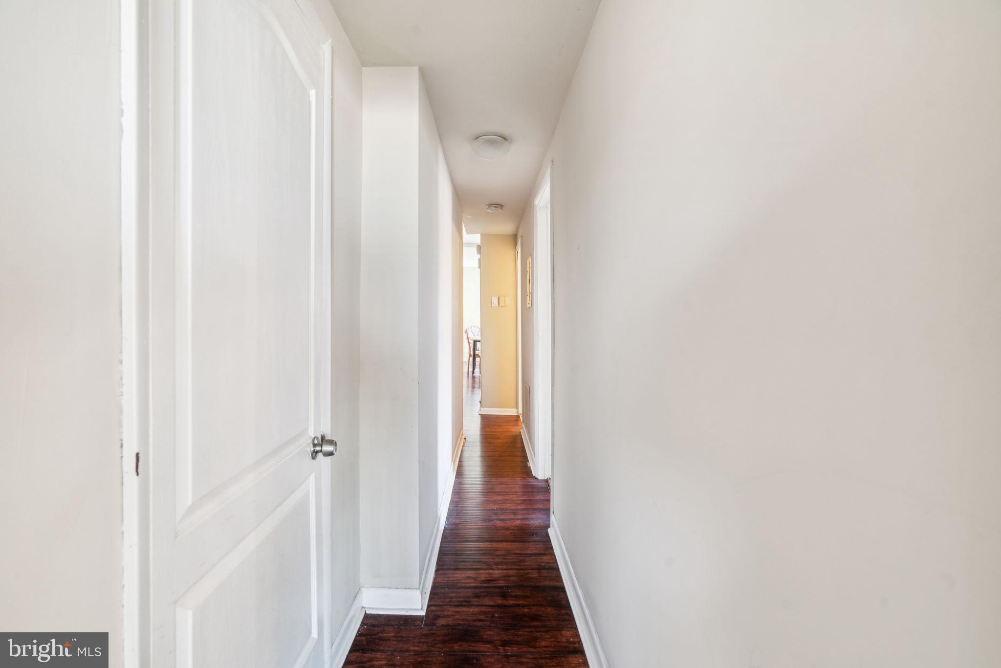 4036 Spring Garden Street Philadelphia, PA 19104 - Photo 26 of 46 a view of a hallway with wooden floor