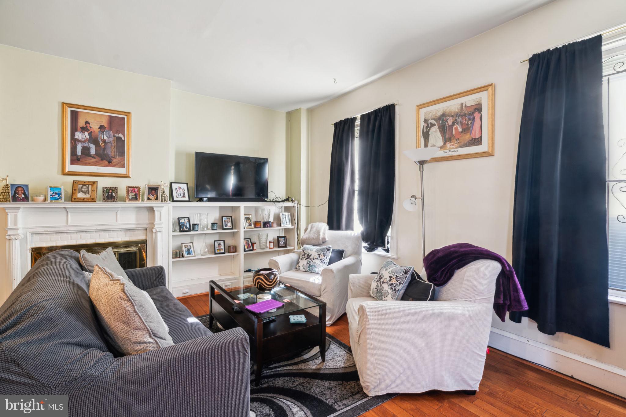4036 Spring Garden Street Philadelphia, PA 19104 - Photo 29 of 46 a living room with furniture and a flat screen tv