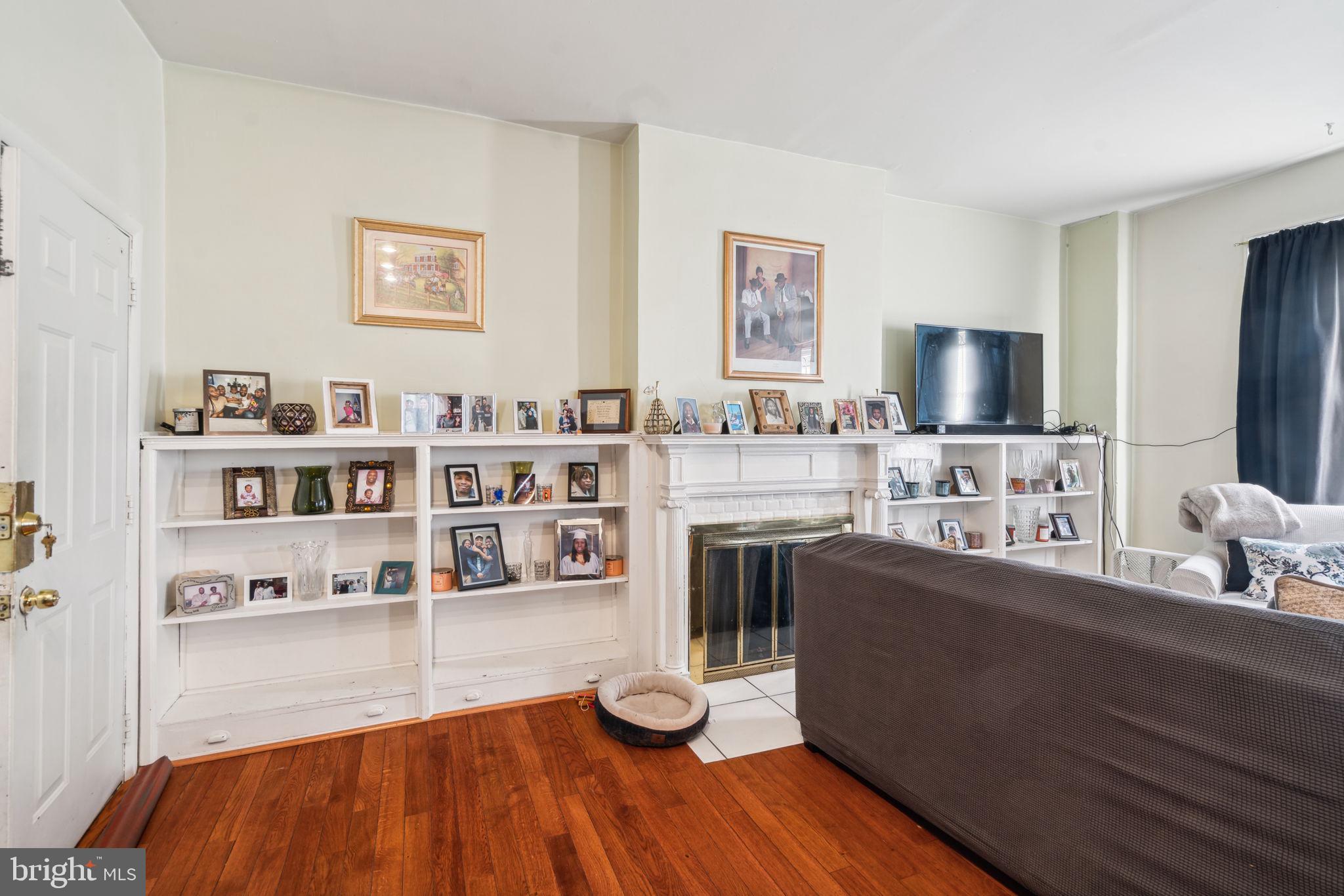 4036 Spring Garden Street Philadelphia, PA 19104 - Photo 32 of 46 a living room with furniture and a flat screen tv