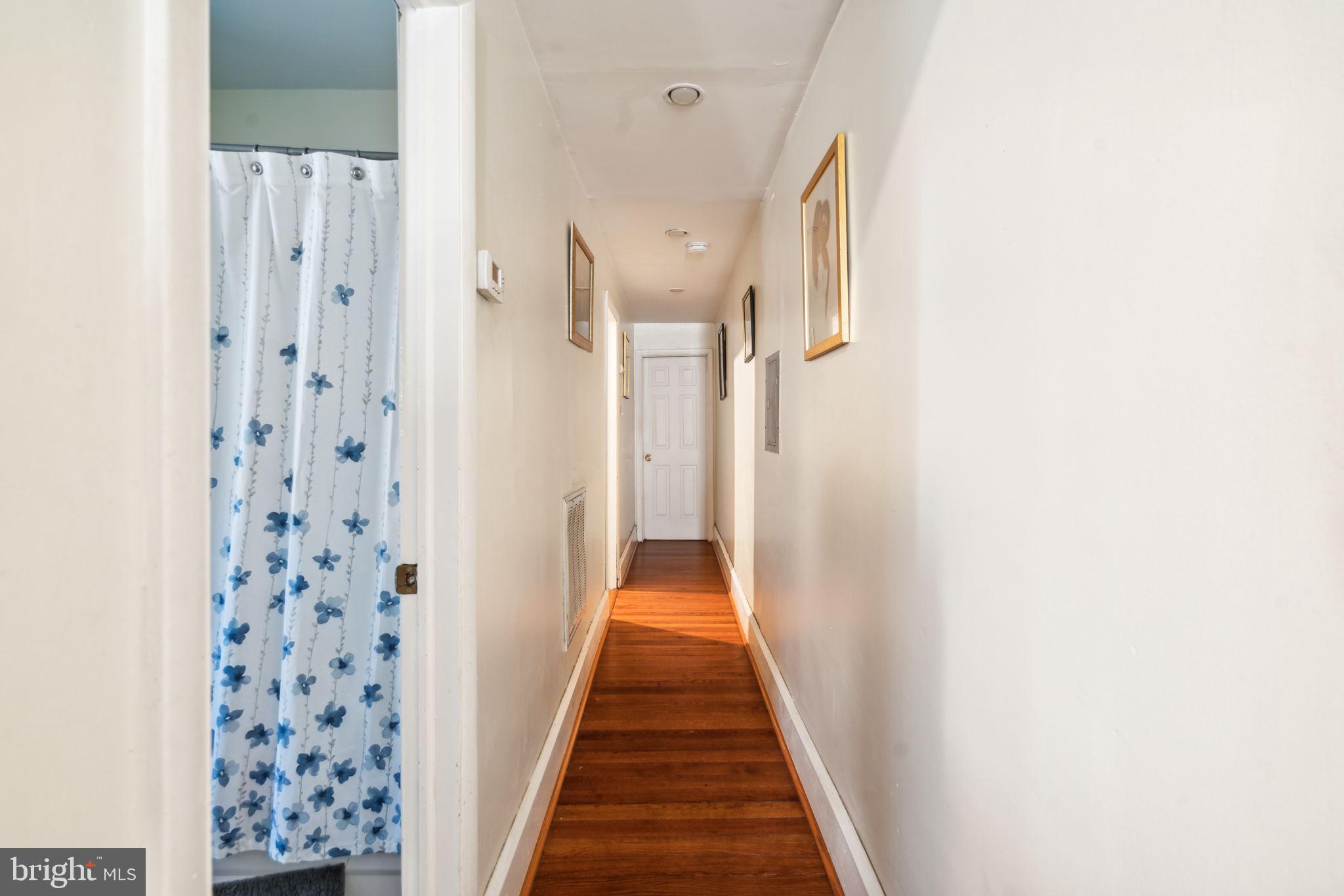 4036 Spring Garden Street Philadelphia, PA 19104 - Photo 33 of 46 a view of a hallway with wooden floor and closet