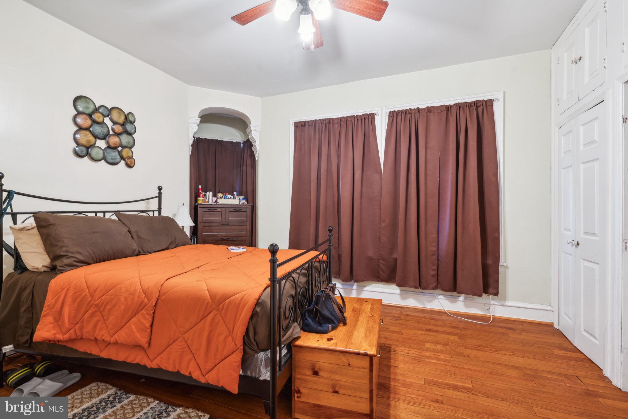 4036 Spring Garden Street Philadelphia, PA 19104 - Photo 39 of 46 a bedroom with bed and wooden floor