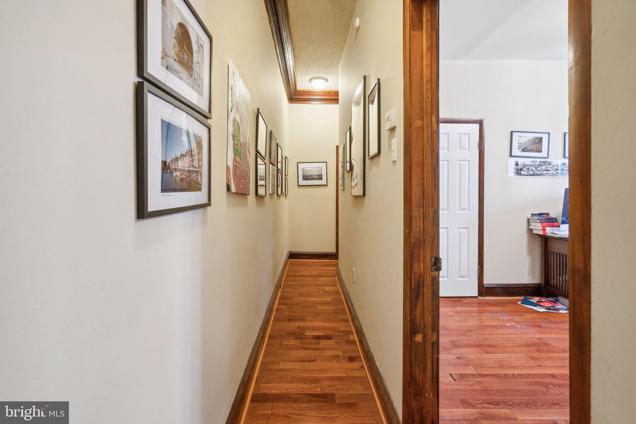 4036 Spring Garden Street Philadelphia, PA 19104 - Photo 7 of 46 a view of a hallway with wooden floor and entryway