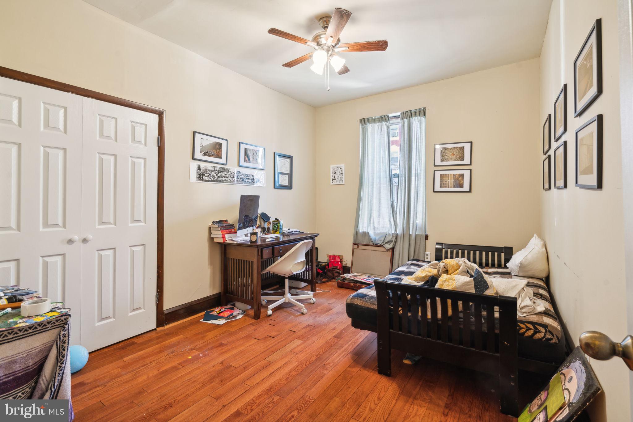 4036 Spring Garden Street Philadelphia, PA 19104 - Photo 8 of 46 a bedroom with furniture and a window