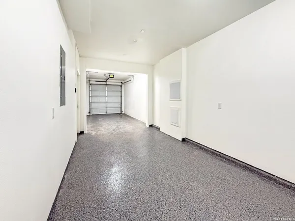 an empty room with windows