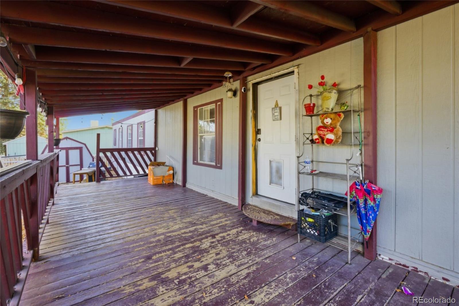 11990 East South Boulder Road Lafayette, CO 80026 - Photo 17 of 20 a view of an outdoor space with wooden floor