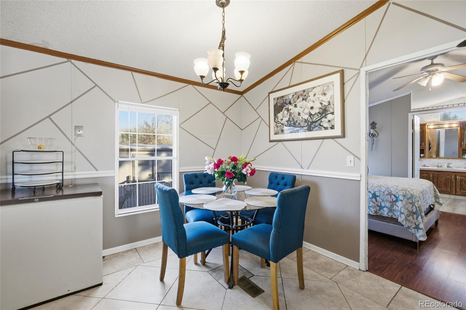 11990 East South Boulder Road Lafayette, CO 80026 - Photo 5 of 20 a dining room with furniture and window