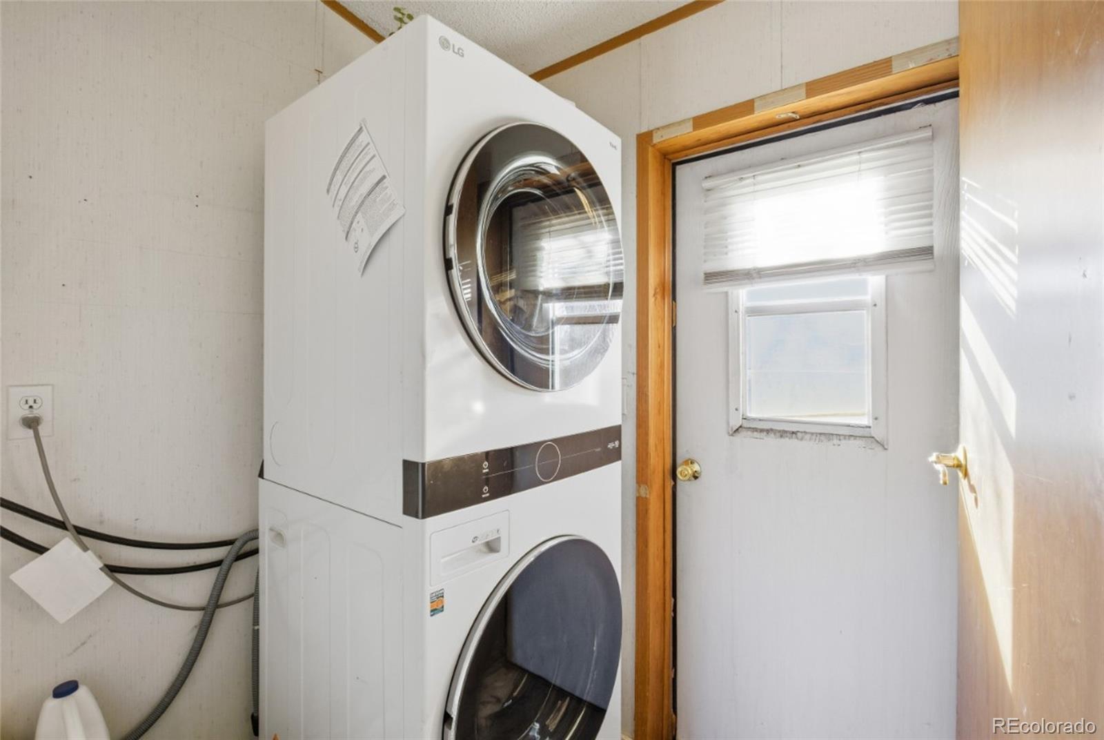 11990 East South Boulder Road Lafayette, CO 80026 - Photo 9 of 20 a utility room with dryer and washer