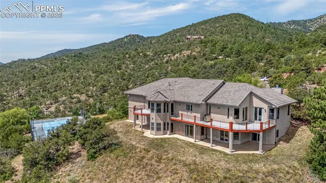 a aerial view of a house with a garden view