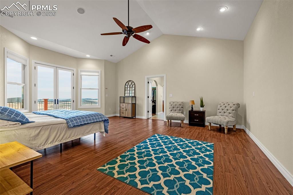 15575 Henry Ride Heights Colorado Springs, CO 80926 - Photo 23 of 46 a living room with furniture and a wooden floor
