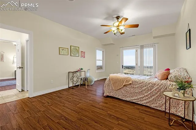 a bedroom with bed and window