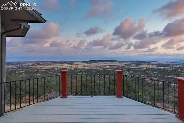 a view of a balcony with city view