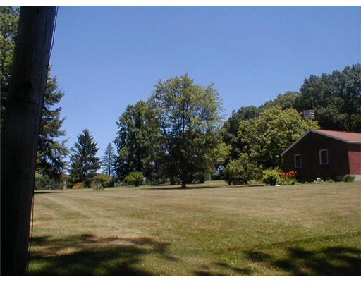 221 Brose Road Cabot, PA 16023 - Photo 2 of 7 Exterior Front. Side yard to back yard