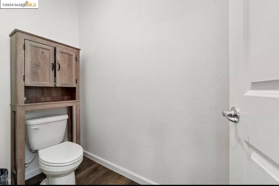 1749 Botticelli Way Lodi, CA 95242 - Photo 16 of 24 a bathroom with a toilet and a sink