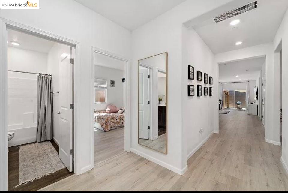 1749 Botticelli Way Lodi, CA 95242 - Photo 6 of 24 a view of a hallway with wooden floor and entryway