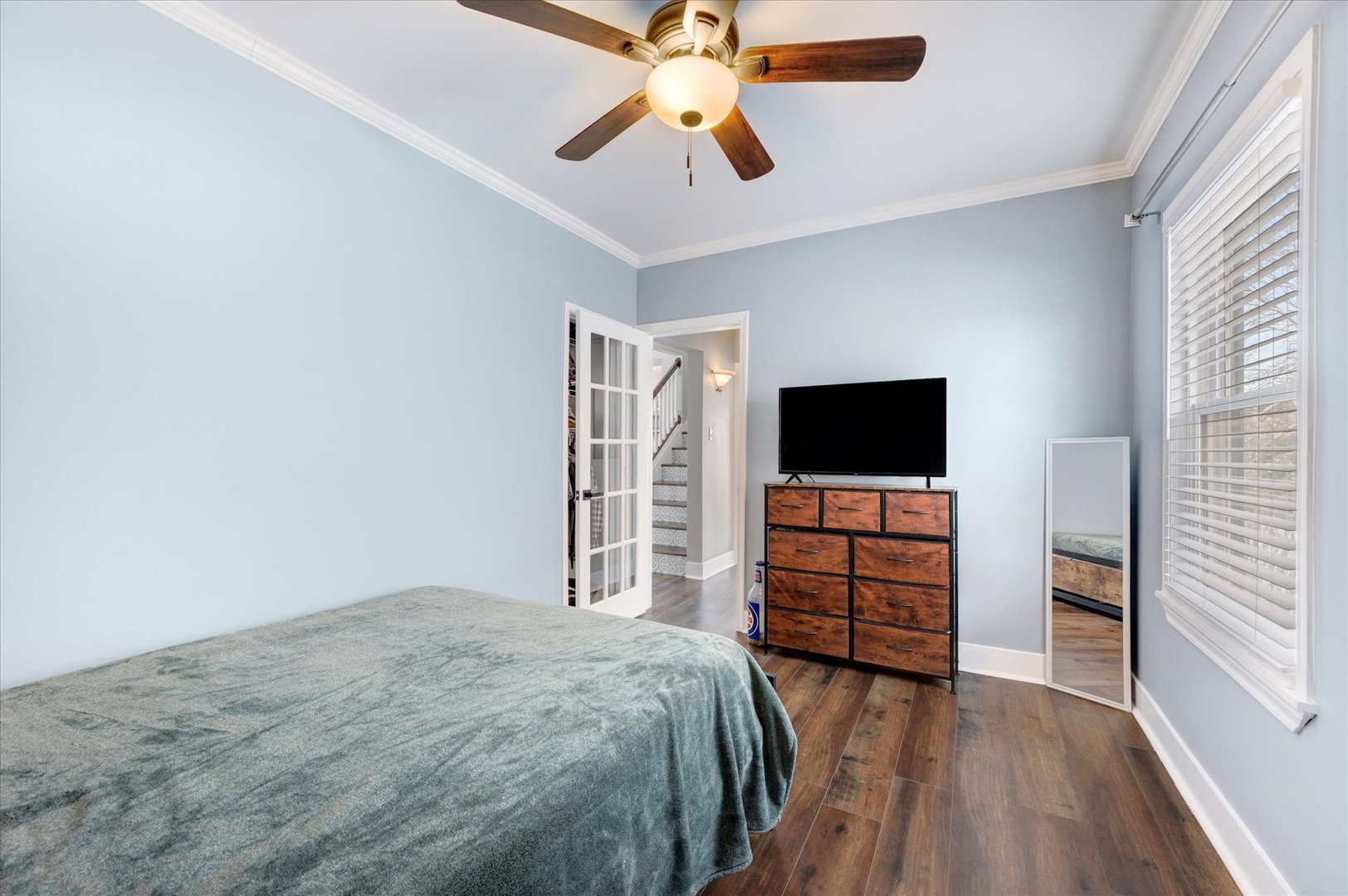 272 North Willow Road Elmhurst, IL 60126 - Photo 14 of 38 a bedroom with a bed and a flat screen tv