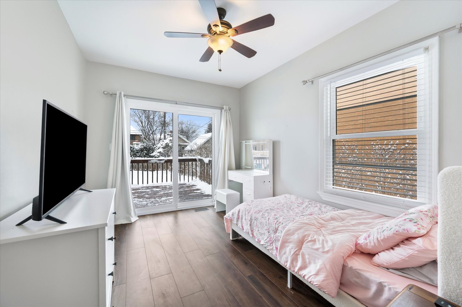 272 North Willow Road Elmhurst, IL 60126 - Photo 17 of 38 a bedroom with a bed tv and a window